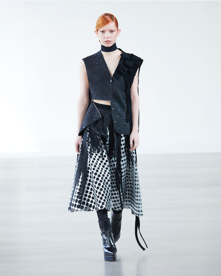 Black zipper jacket and chrome applique skirt