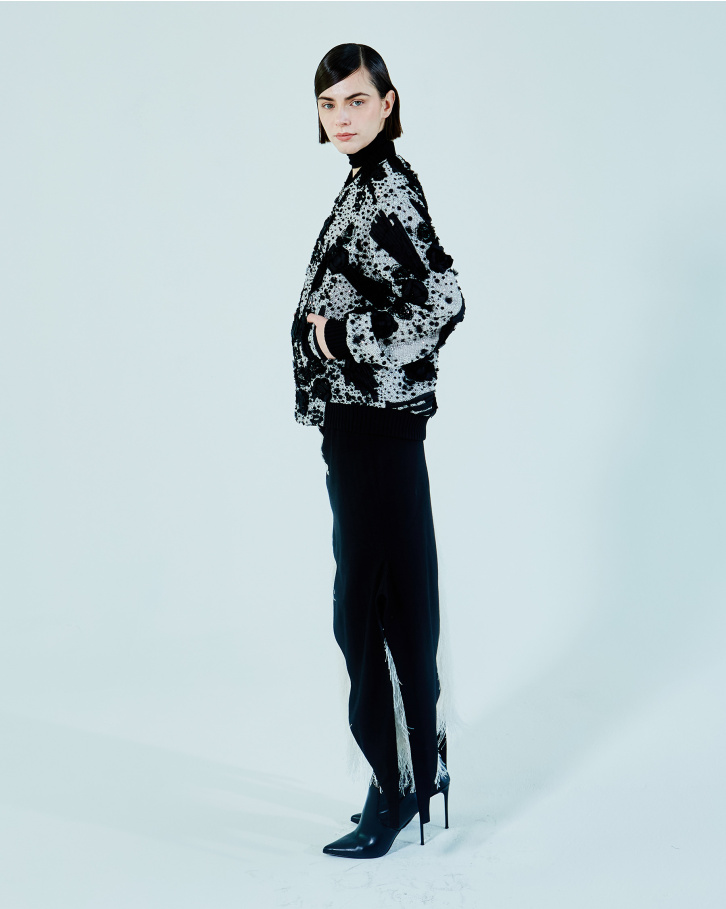 Moonstone jacket and black and white skirt