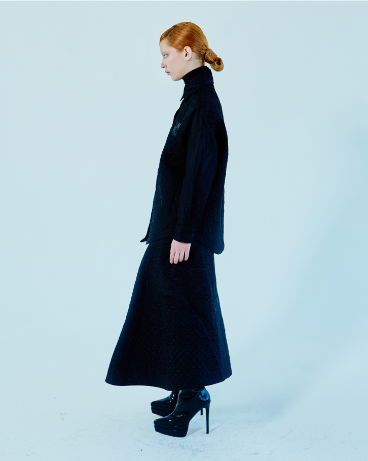 Black monogrammed jacket with skirt
