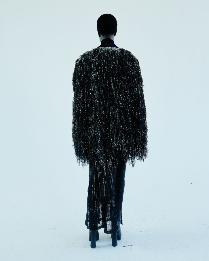 Black sheer-based, dress with gunmetal fringed jacket