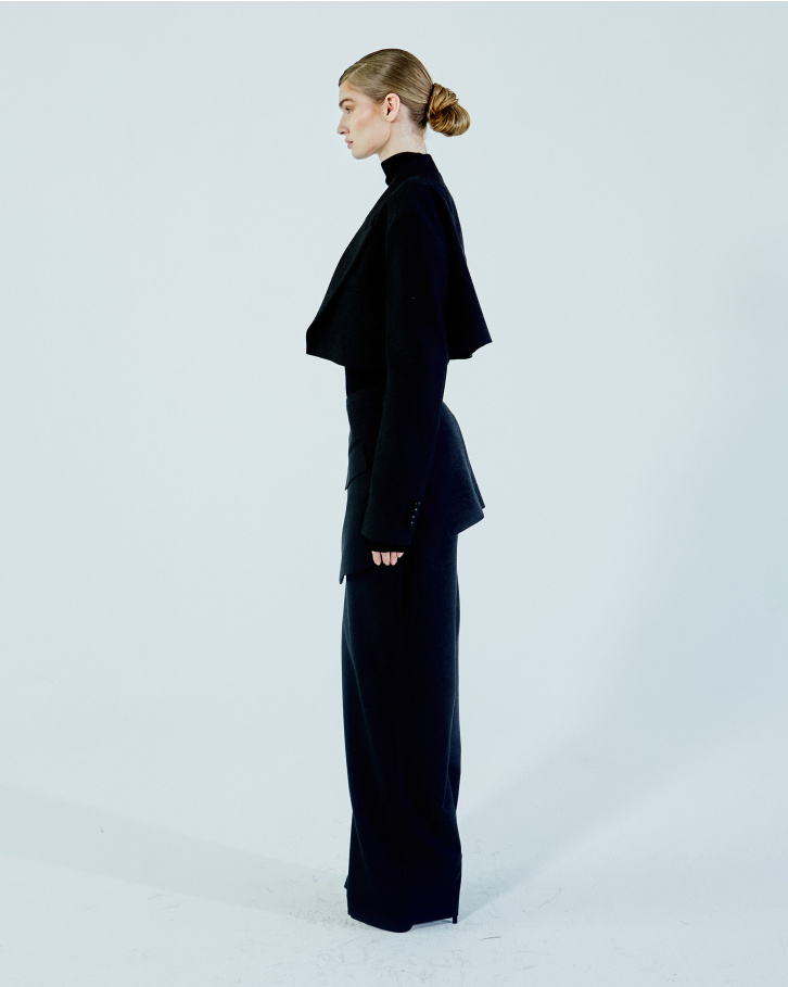 Black turtleneck sweater with grey blazer and pants