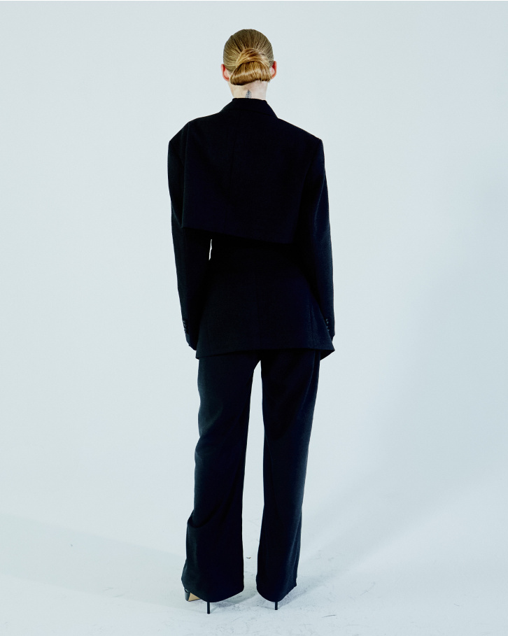 Black turtleneck sweater with grey blazer and pants
