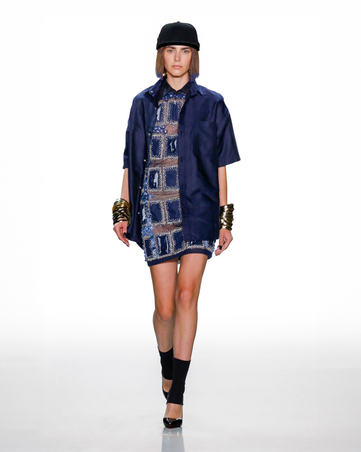 Blue cut-out dress with a monogrammed shirt