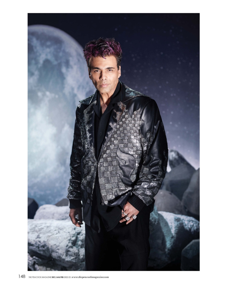 Black leather jacket with sequined checks, styled with a black shirt and a pair of black trousers