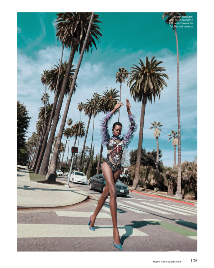 Black bodysuit with multicoloured feathered sleeves