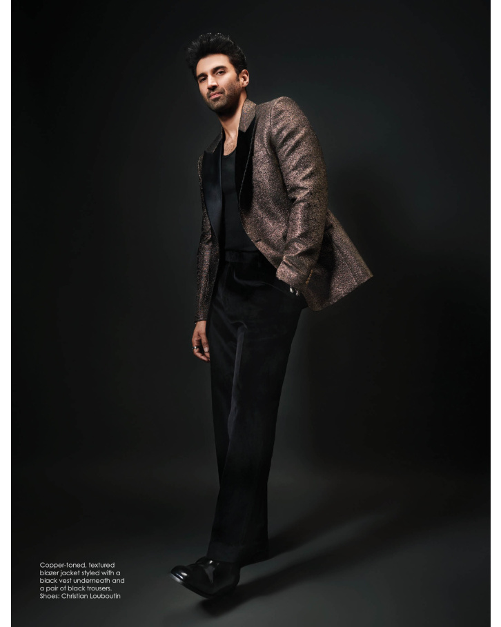 textured blazer jacket with black trousers