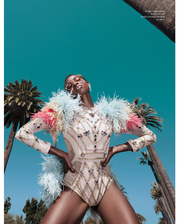 Beige bodysuit with multicoloured feather