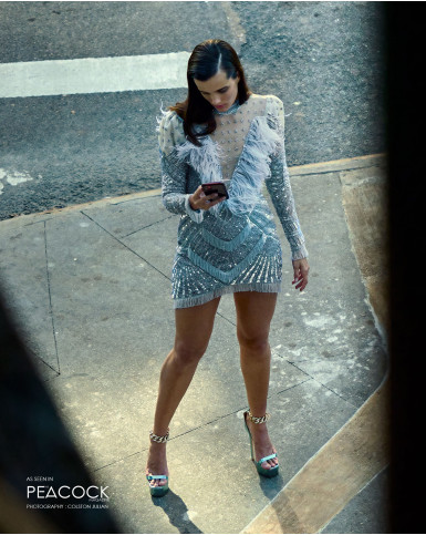 Powder blue short dress with a feathered neckline