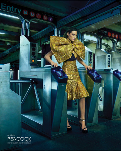 Golden short dress with sequins and bow accent
