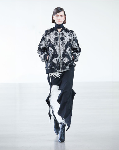 Moonstone jacket and black and white skirt