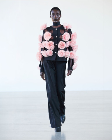 Black jacket with pink flowers and straight pants