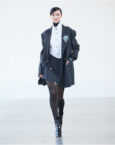Grey blazer with short skirt and white shirt
