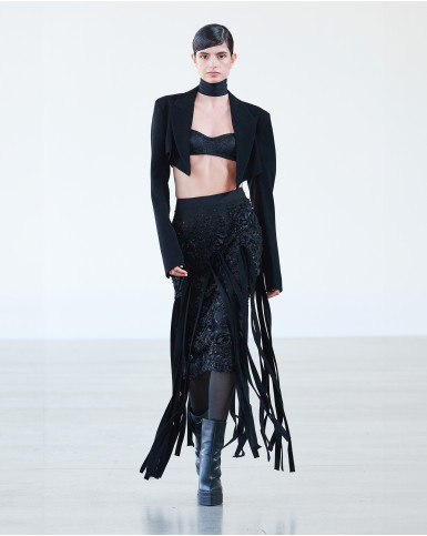 Black fringed skirt with bralette and short jacket
