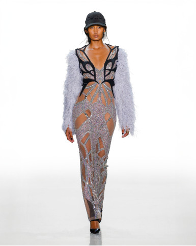 Sheer silver embellished dress with feathered sleeves