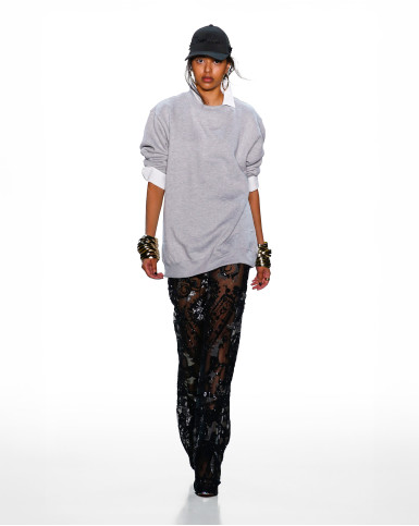 Black embellished sheer pants with collared sweatshirt