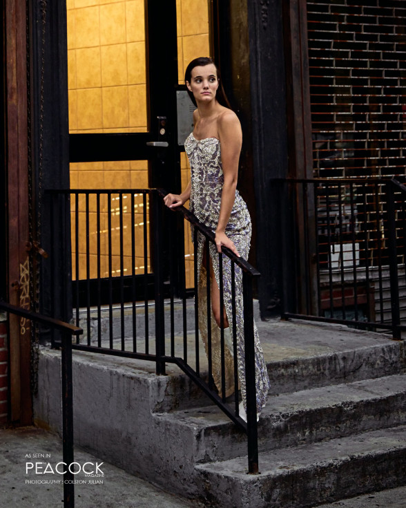 Off-shoulder fitted gown with a thigh high slit