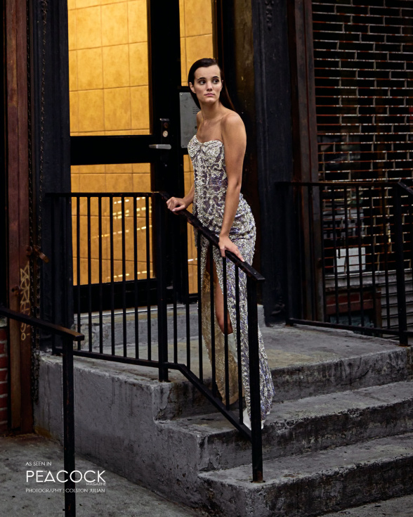 Off-shoulder fitted gown with a thigh high slit