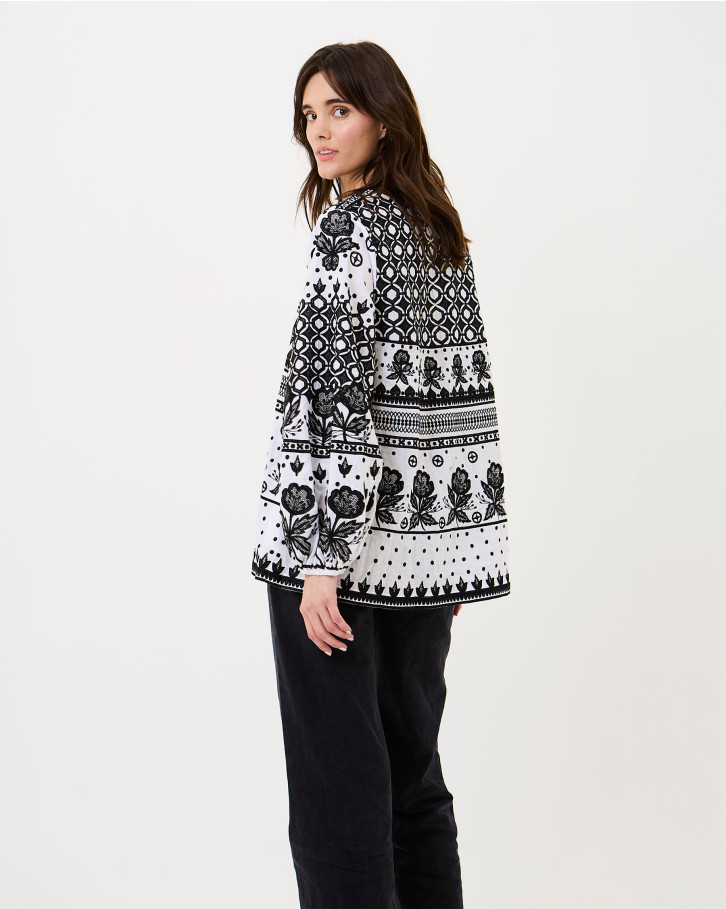 White-based black embroidered top