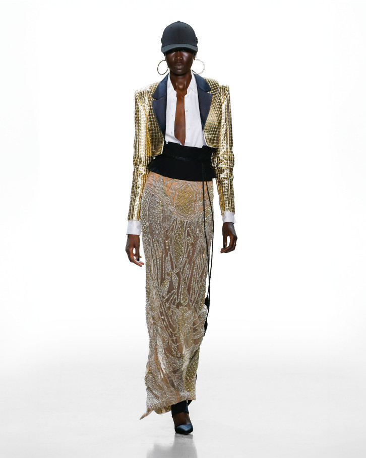 Gold embellished long skirt with a white shirt and a cropped jacket